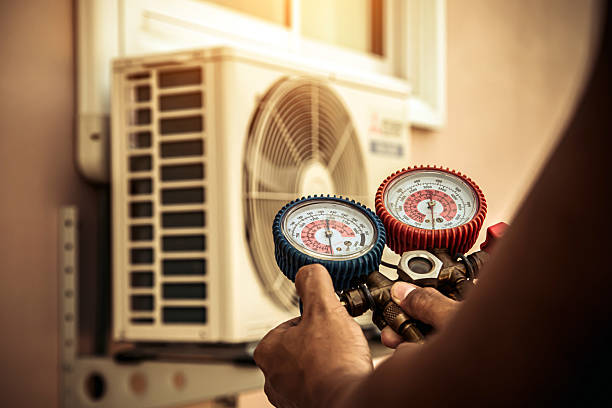 Professional Air Conditioning Service technician working in Linden, AL